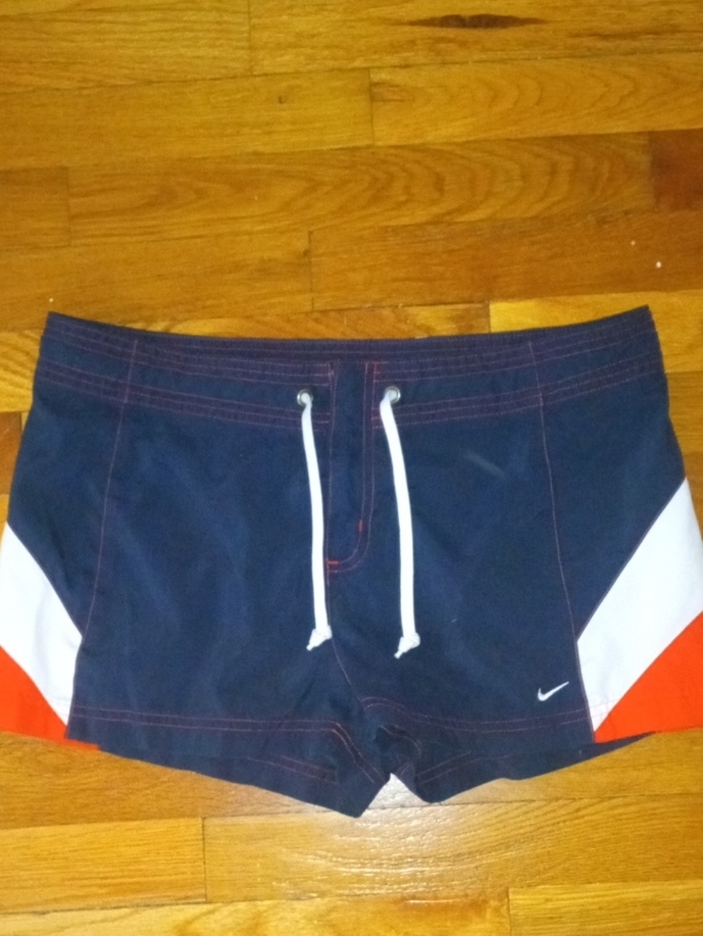 women med NIKE board shorts blue orange